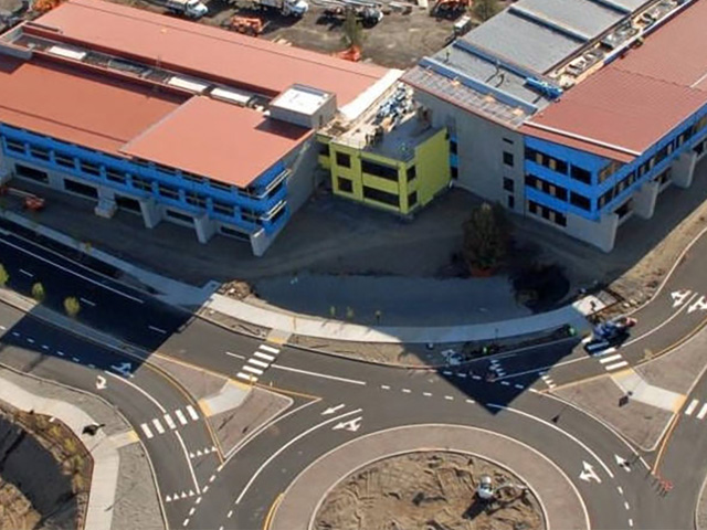 Les Schwab HQ under construction, roundabout in the foreground
