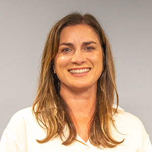 Megan is of fair complexion and hair long brown hair.